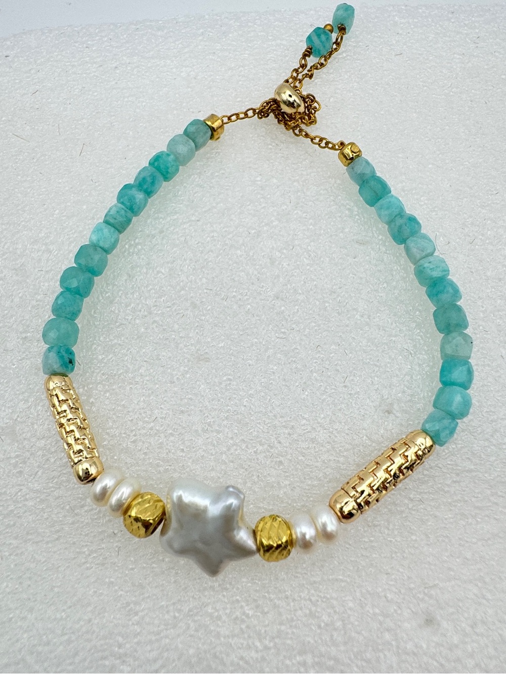 Real fresh water star pearl with amazonite gemstone with gold bead bracelet.